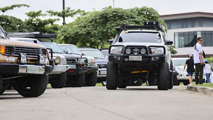 MODIFIED Hilux pickups from several generations line up during the Toyota Legacy Experience.