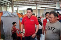 DSWD Secretary Rex Gatchalian (left) visited evacuees at Barangay Manresa Covered Court in Quezon City at around 12:25 p.m. on Tuesday noon, 18 August 2026.