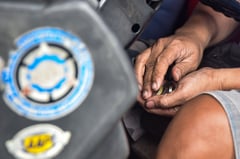 Jeepney driver pays in coins for fuel