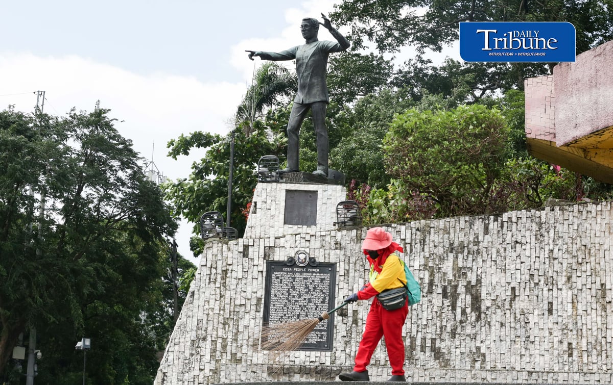 (August 20 2026) MMDA street sweeper was seen cleaning near the statue of former Senator Benigno "Ninoy" Aquino Jr, at people power monument along Edsa in Quezon City on Thursday August 20 2026, ahead of Ninoy Aquino 43rd death anniversary and assassination on Friday August 21. Photo/Analy Labor