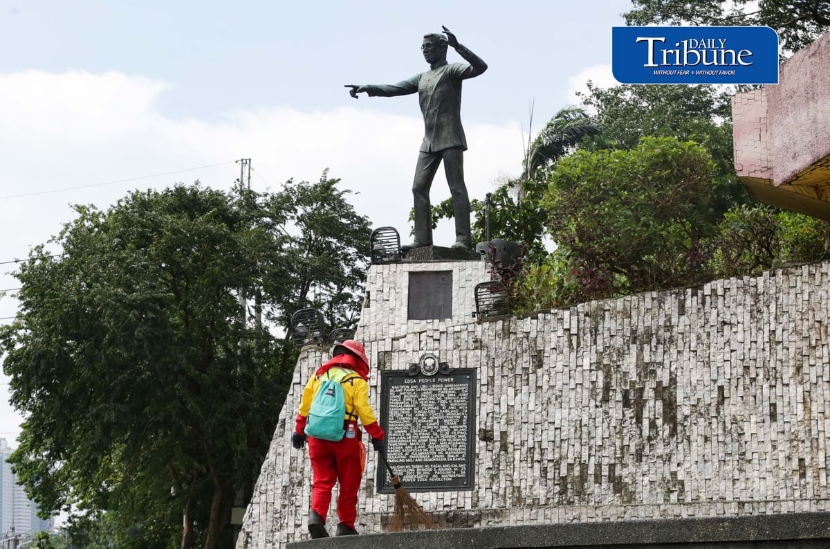(August 20 2026) MMDA street sweeper was seen cleaning near the statue of former Senator Benigno "Ninoy" Aquino Jr, at people power monument along Edsa in Quezon City on Thursday August 20 2026, ahead of Ninoy Aquino 43rd death anniversary and assassination on Friday August 21. Photo/Analy Labor