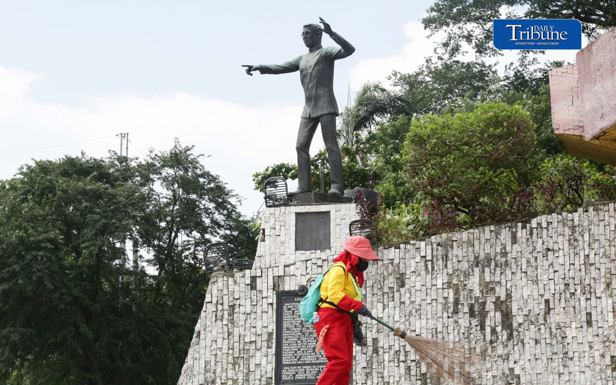 (August 20 2026) MMDA street sweeper was seen cleaning near the statue of former Senator Benigno "Ninoy" Aquino Jr, at people power monument along Edsa in Quezon City on Thursday August 20 2026, ahead of Ninoy Aquino 43rd death anniversary and assassination on Friday August 21. Photo/Analy Labor