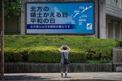 Japan protests Russian missile tests off
disputed islands