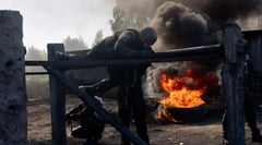 Man charged for trying to pass military intel