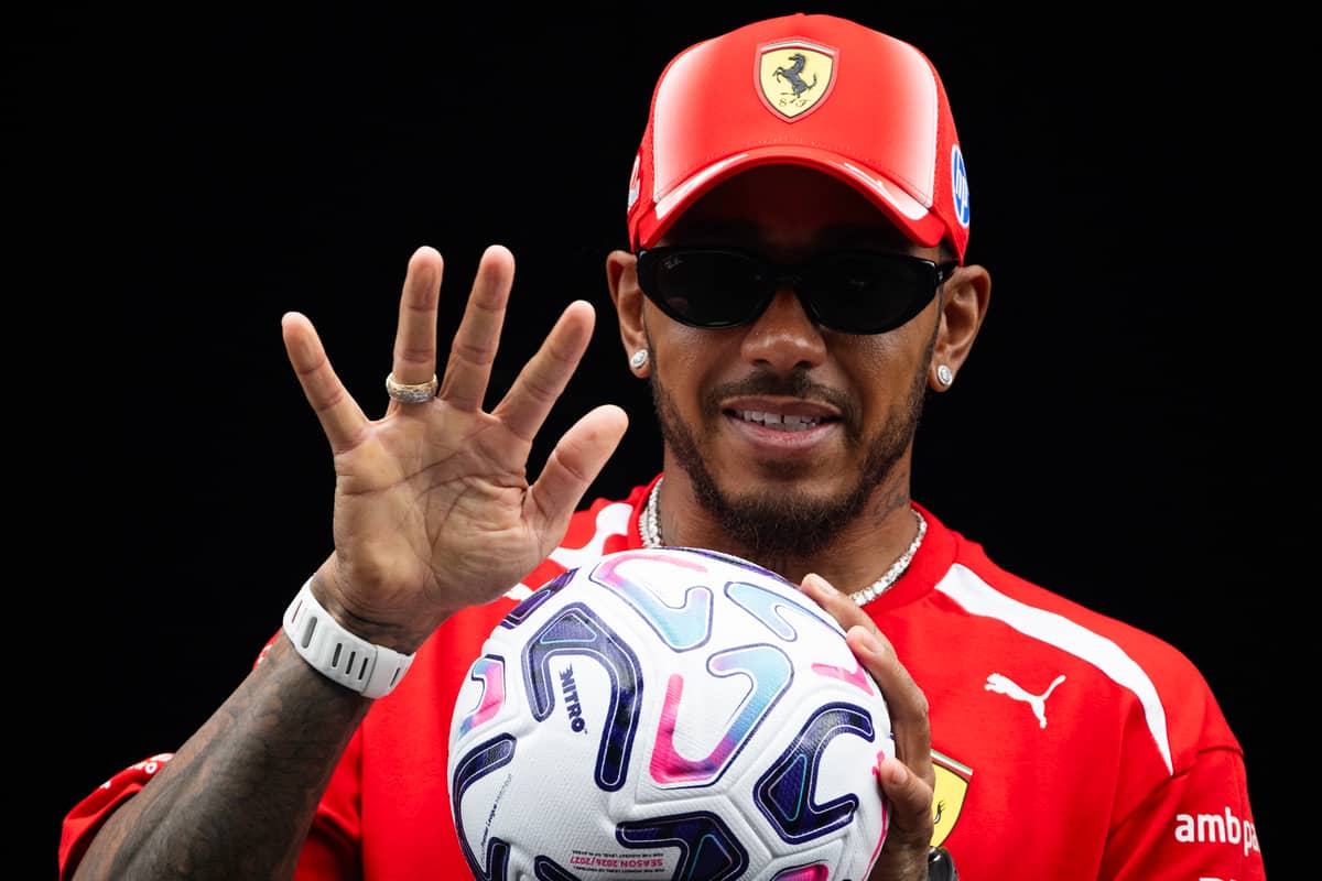 RELAXED Ferrari driver Lewis Hamilton plays with a ball before the Dutch Grand Prix at Zandvoort.