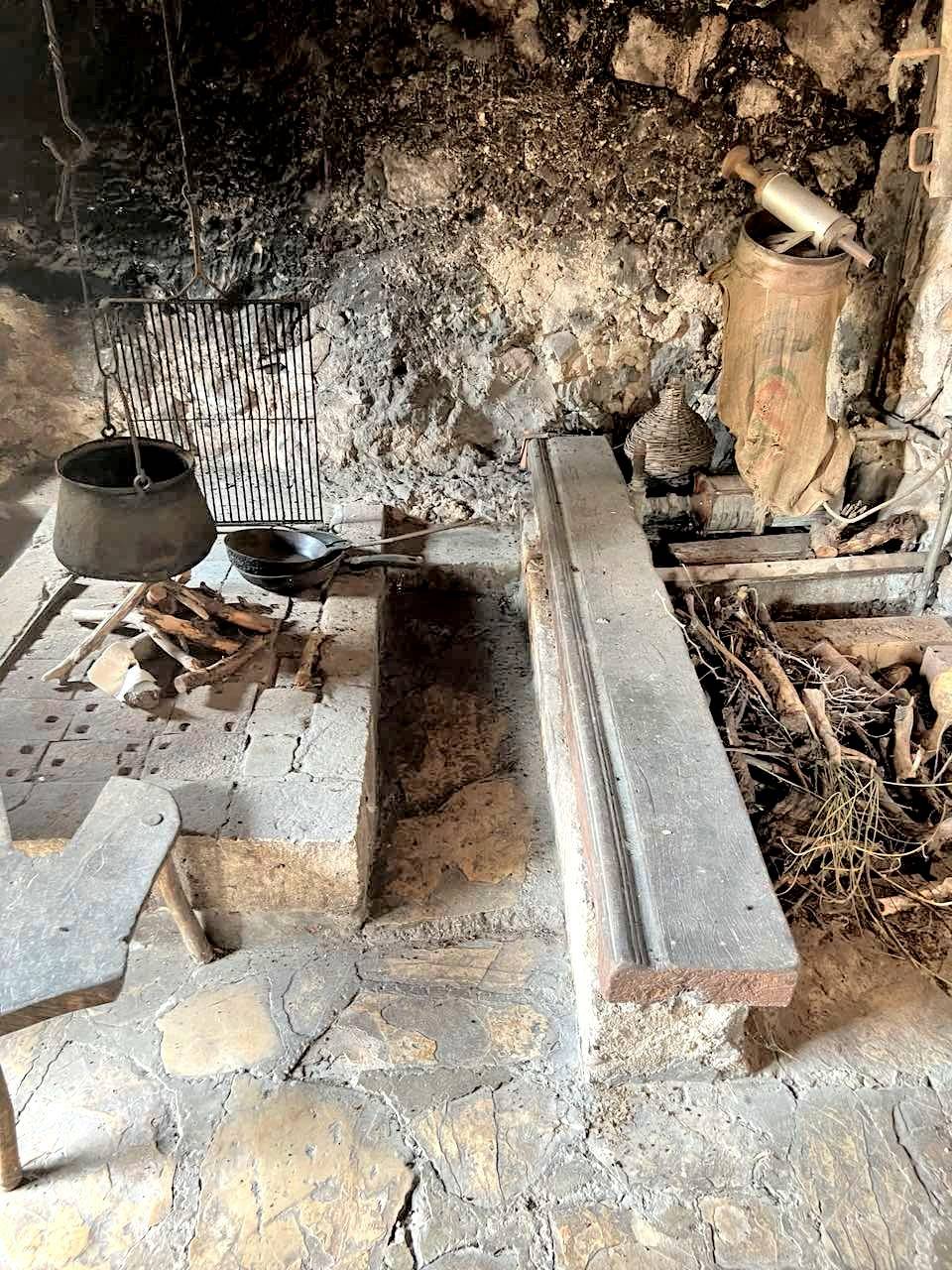A mini cauldron and fireplace.