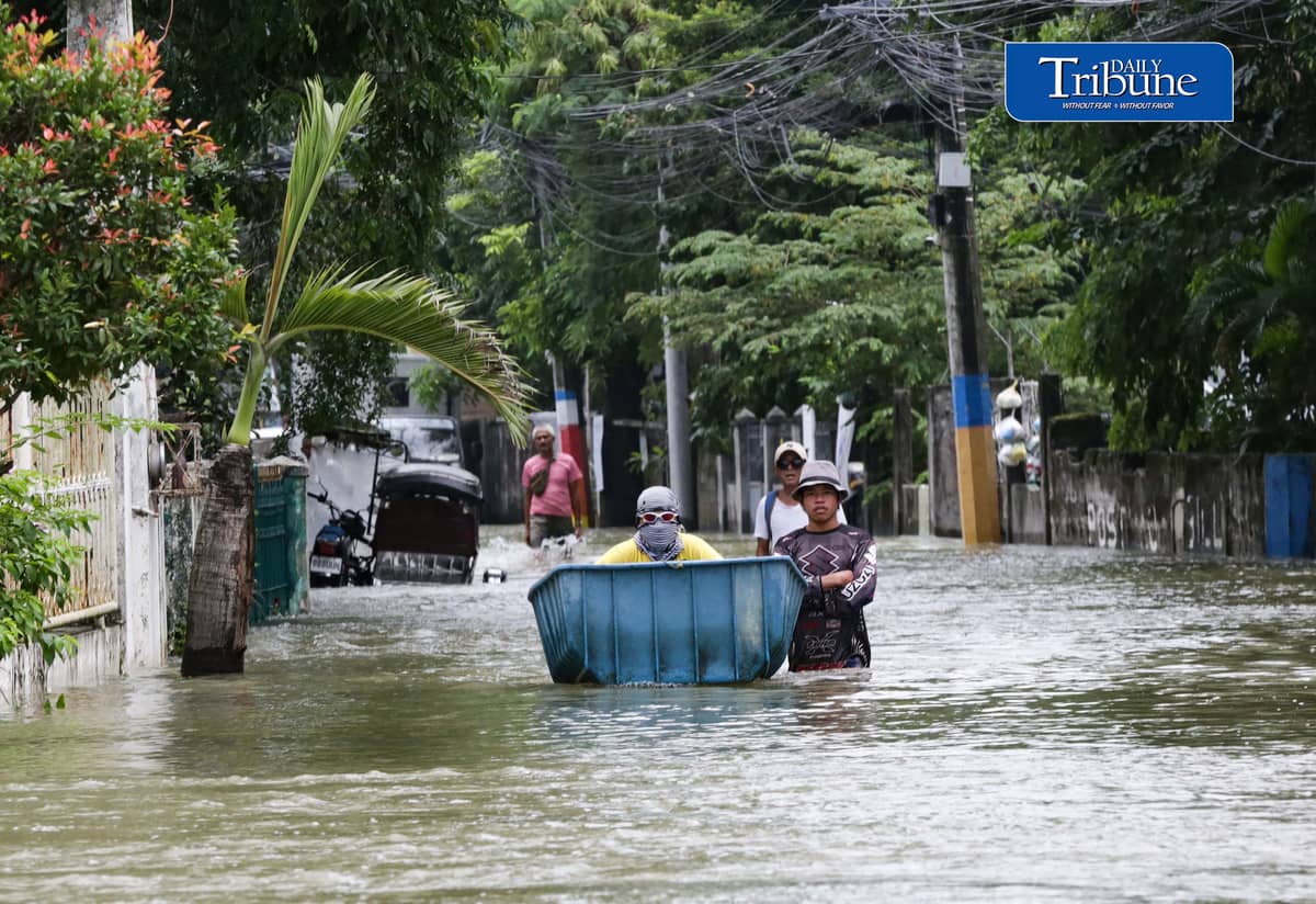 (August 22 2026) Residents of Barangay San juan, Sta Ana, and Palapat in Hagonoy Bulacan walk through waist-deep floodwaters, according to residents they have been enduring the floods for two weeks, they blame the unfinished flood gate structure in barangay Iba Hagonoy that supposed to help but end up blocking the pathways of floodwater, on Saturday August 22, 2026. Photo/Analy Labor