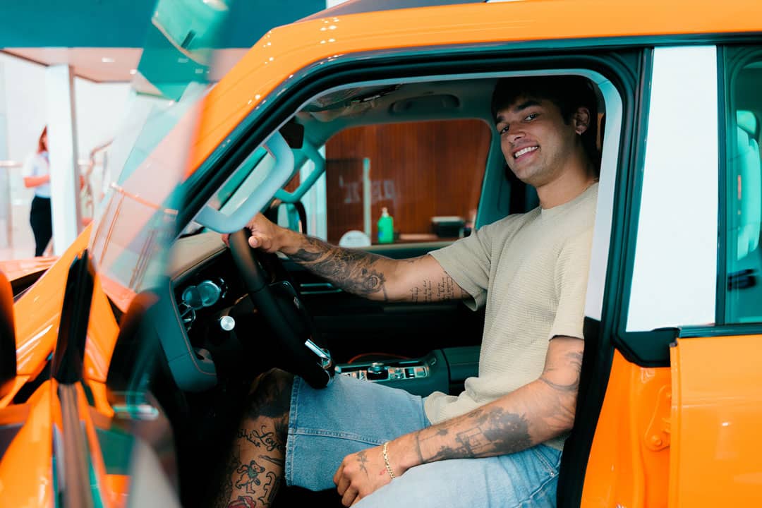 KOBE Paras takes the driver’s seat of a BAIC vehicle after making the switch to hybrid ownership.