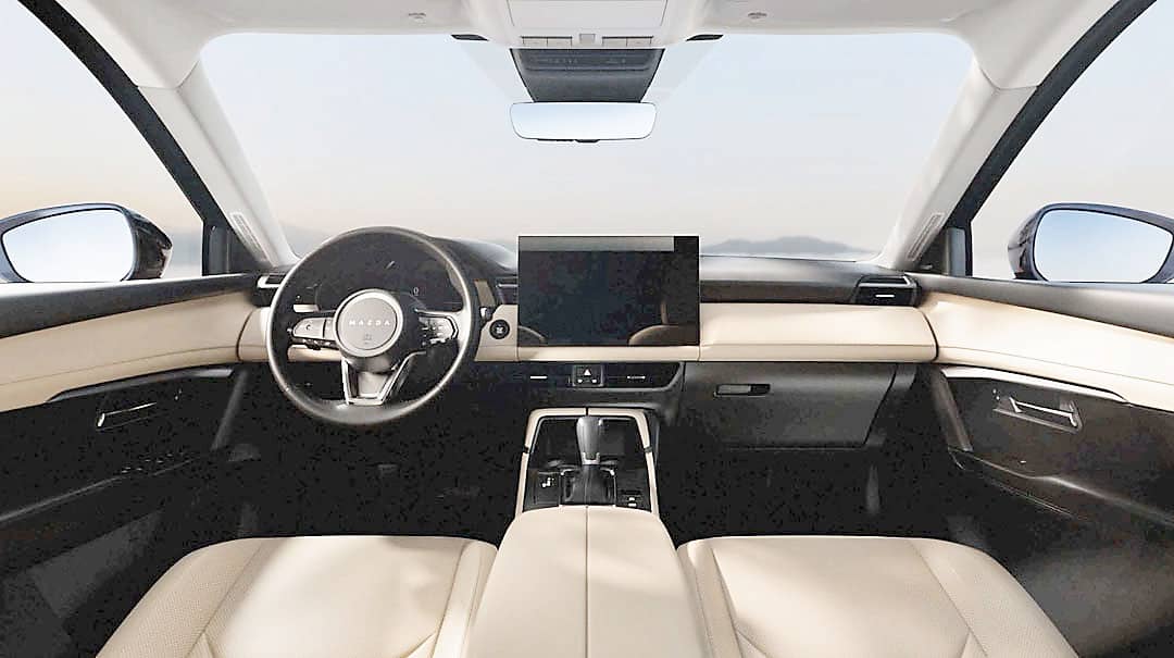 A 15.6-inch touchscreen anchors the dashboard and manages infotainment, climate functions and the 360-degree camera.