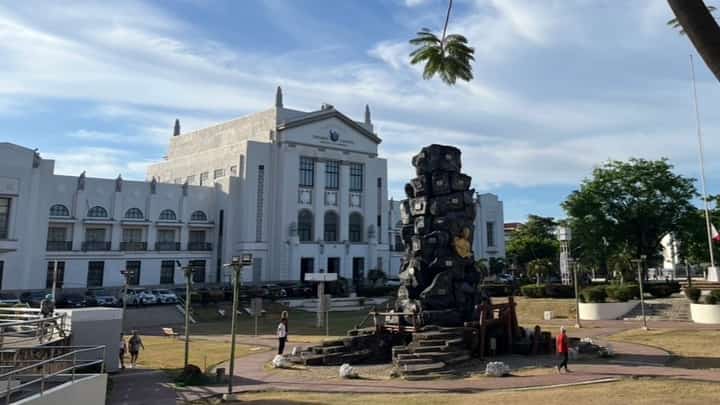 THE Quezon Provincial Capitol rises behind Perez Park, the historic civic heart of the provincial complex.