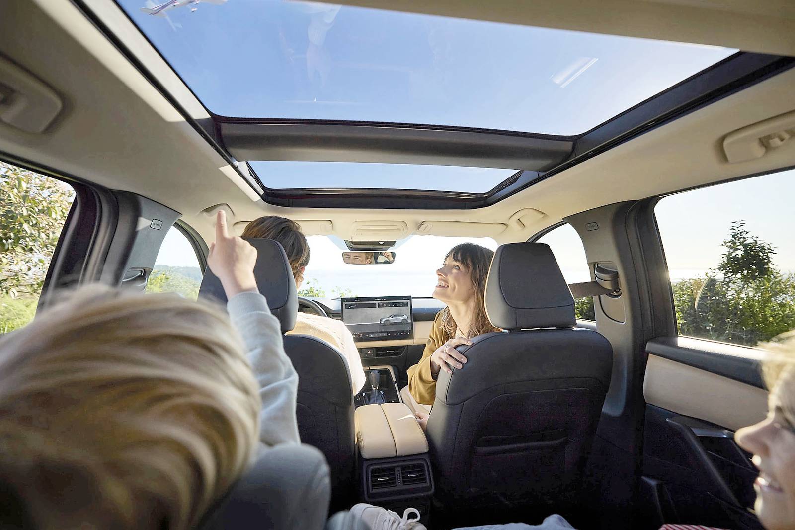 PASSENGERS get more rear knee room and headroom beneath the CX-5’s panoramic glass roof.