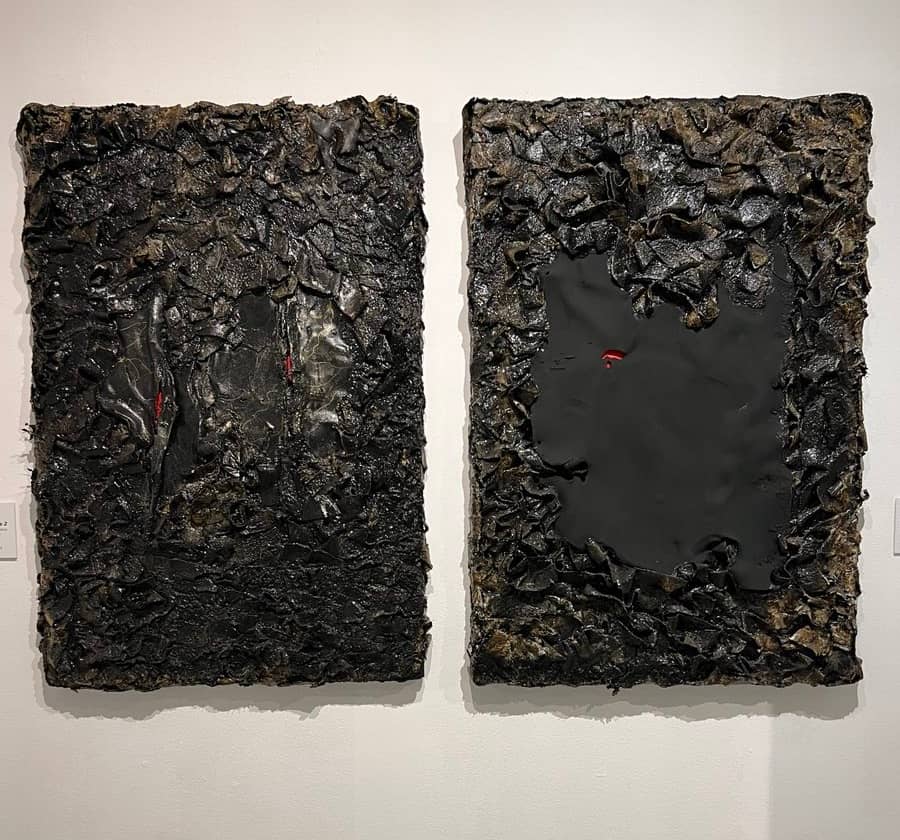 (LEFT) ‘Fractured Slice 2,’ waterproof membrane, adhesive, fire, paint, 24 x 36 inches, 2025. (Right) ‘Fractured Slice 1,’ waterproof membrane, adhesive, fire, paint, 24 x 36 inches, 2025.