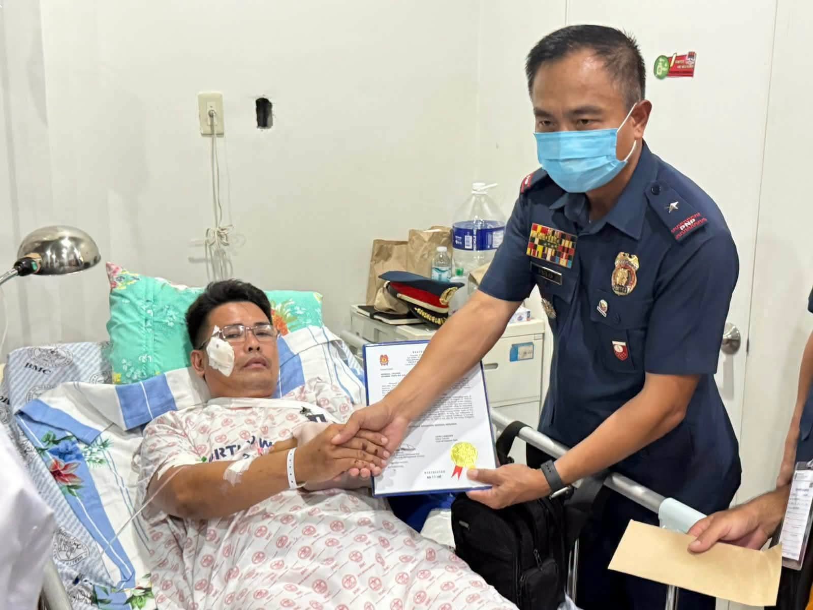 PNP chief hails cop who lost arm while subduing armed man