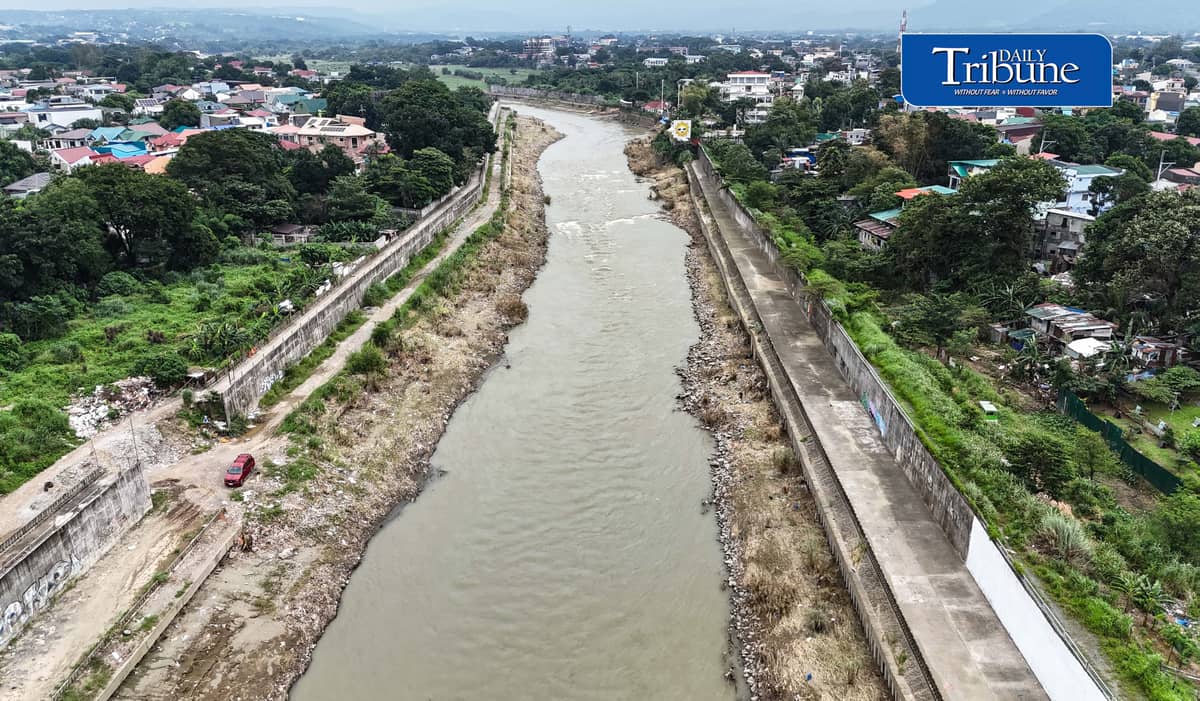 (August 25 2026) The flood control structure along the Marikina River, protecting San Mateo and Quezon City, seen from the Batasan–San Mateo Bridge on Tuesday August 25, 2026. The Department of Budget and Management (DBM) released ₱1 billion to strengthen Project NOAH’s (Nationwide Operational Assessment of Hazards) artificial intelligence-powered flood forecasting capabilities. Geologist Mahar Francisco Amante Lagmay, executive director of Project NOAH, said the initiative aims to provide science-based research and data that can help the Department of Public Works and Highways (DPWH) in planning and constructing flood-control projects. Photo/Analy Labor