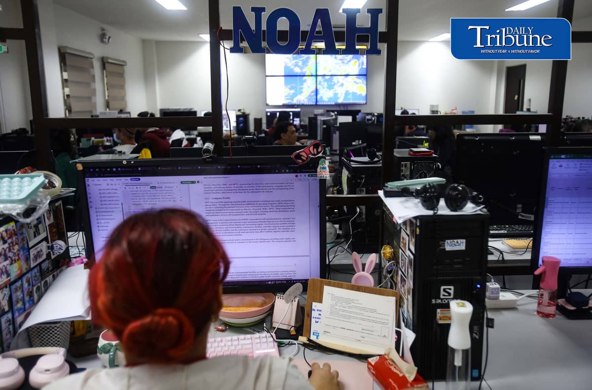 (August 25 2026) Geologist and executive director of Project NOAH (Nationwide Operational Assessment of Hazards) Mahar Francisco Amante Lagmay, with the group of researchers continues to monitor the effect of typhoon Obet at their office in UP DIliman, on Tuesday, August 25, 2026. The Department of Budget and Management (DBM) announced the release of P1 billion to strengthen Project Nationwide Operational Assessment of Hazards' (NOAH) artificial intelligence-powered flood forecasting capabilities. Lagmay said the budget will be used to boost the project's real-time hazard monitoring and disaster prevention capabilities such as upcoming “Bahar” Baha Augmented Reality a smartphone tool that uses augmented reality to display flood water levels on real street neighbours. Photo/Analy Labor