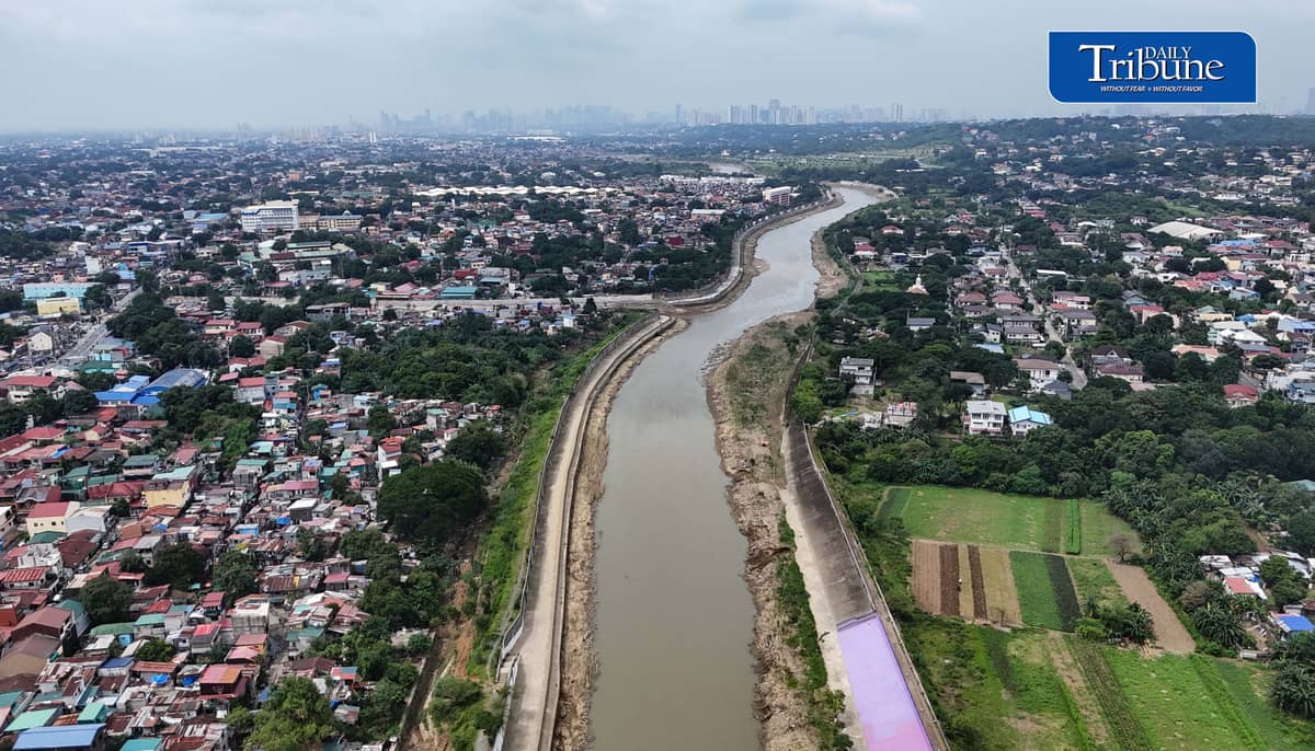 (August 25 2026) The flood control structure along the Marikina River, protecting San Mateo and Quezon City, seen from the Batasan–San Mateo Bridge on Tuesday August 25, 2026. The Department of Budget and Management (DBM) released ₱1 billion to strengthen Project NOAH’s (Nationwide Operational Assessment of Hazards) artificial intelligence-powered flood forecasting capabilities. Geologist Mahar Francisco Amante Lagmay, executive director of Project NOAH, said the initiative aims to provide science-based research and data that can help the Department of Public Works and Highways (DPWH) in planning and constructing flood-control projects. Photo/Analy Labor