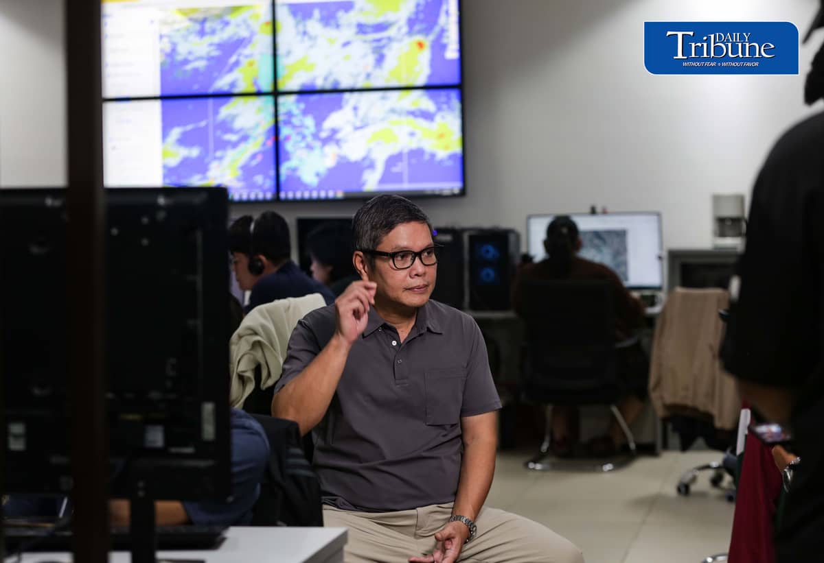 (August 25 2026) Geologist and executive director of Project NOAH (Nationwide Operational Assessment of Hazards) Mahar Francisco Amante Lagmay, with the group of researchers continues to monitor the effect of typhoon Obet at their office in UP DIliman, on Tuesday, August 25, 2026. The Department of Budget and Management (DBM) announced the release of P1 billion to strengthen Project Nationwide Operational Assessment of Hazards' (NOAH) artificial intelligence-powered flood forecasting capabilities. Lagmay said the budget will be used to boost the project's real-time hazard monitoring and disaster prevention capabilities such as upcoming “Bahar” Baha Augmented Reality a smartphone tool that uses augmented reality to display flood water levels on real street neighbours. Photo/Analy Labor