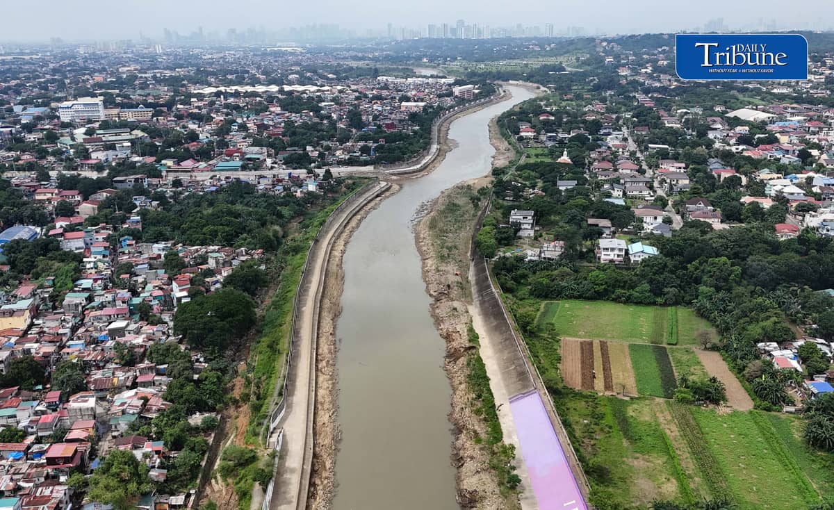 (August 25 2026) The flood control structure along the Marikina River, protecting San Mateo and Quezon City, seen from the Batasan–San Mateo Bridge on Tuesday August 25, 2026. The Department of Budget and Management (DBM) released ₱1 billion to strengthen Project NOAH’s (Nationwide Operational Assessment of Hazards) artificial intelligence-powered flood forecasting capabilities. Geologist Mahar Francisco Amante Lagmay, executive director of Project NOAH, said the initiative aims to provide science-based research and data that can help the Department of Public Works and Highways (DPWH) in planning and constructing flood-control projects. Photo/Analy Labor