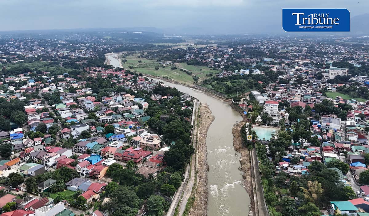(August 25 2026) The flood control structure along the Marikina River, protecting San Mateo and Quezon City, seen from the Batasan–San Mateo Bridge on Tuesday August 25, 2026. The Department of Budget and Management (DBM) released ₱1 billion to strengthen Project NOAH’s (Nationwide Operational Assessment of Hazards) artificial intelligence-powered flood forecasting capabilities. Geologist Mahar Francisco Amante Lagmay, executive director of Project NOAH, said the initiative aims to provide science-based research and data that can help the Department of Public Works and Highways (DPWH) in planning and constructing flood-control projects. Photo/Analy Labor