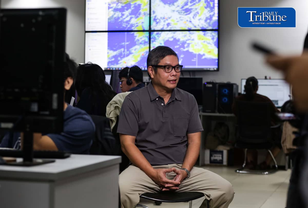 (August 25 2026) Geologist and executive director of Project NOAH (Nationwide Operational Assessment of Hazards) Mahar Francisco Amante Lagmay, with the group of researchers continues to monitor the effect of typhoon Obet at their office in UP DIliman, on Tuesday, August 25, 2026. The Department of Budget and Management (DBM) announced the release of P1 billion to strengthen Project Nationwide Operational Assessment of Hazards' (NOAH) artificial intelligence-powered flood forecasting capabilities. Lagmay said the budget will be used to boost the project's real-time hazard monitoring and disaster prevention capabilities such as upcoming “Bahar” Baha Augmented Reality a smartphone tool that uses augmented reality to display flood water levels on real street neighbours. Photo/Analy Labor