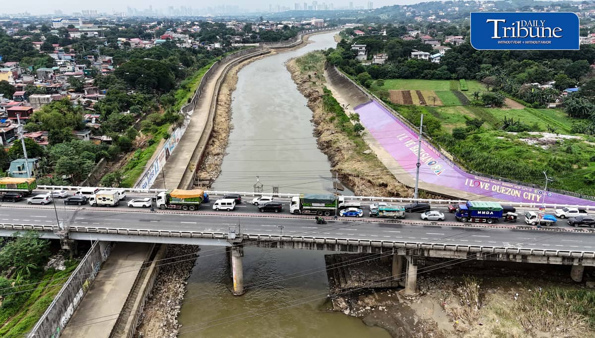 (August 25 2026) The flood control structure along the Marikina River, protecting San Mateo and Quezon City, seen from the Batasan–San Mateo Bridge on Tuesday August 25, 2026. The Department of Budget and Management (DBM) released ₱1 billion to strengthen Project NOAH’s (Nationwide Operational Assessment of Hazards) artificial intelligence-powered flood forecasting capabilities. Geologist Mahar Francisco Amante Lagmay, executive director of Project NOAH, said the initiative aims to provide science-based research and data that can help the Department of Public Works and Highways (DPWH) in planning and constructing flood-control projects. Photo/Analy Labor