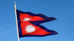 Nepal floods at China border kill