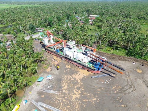 Leyte town celebrates withdrawal of mining dredger