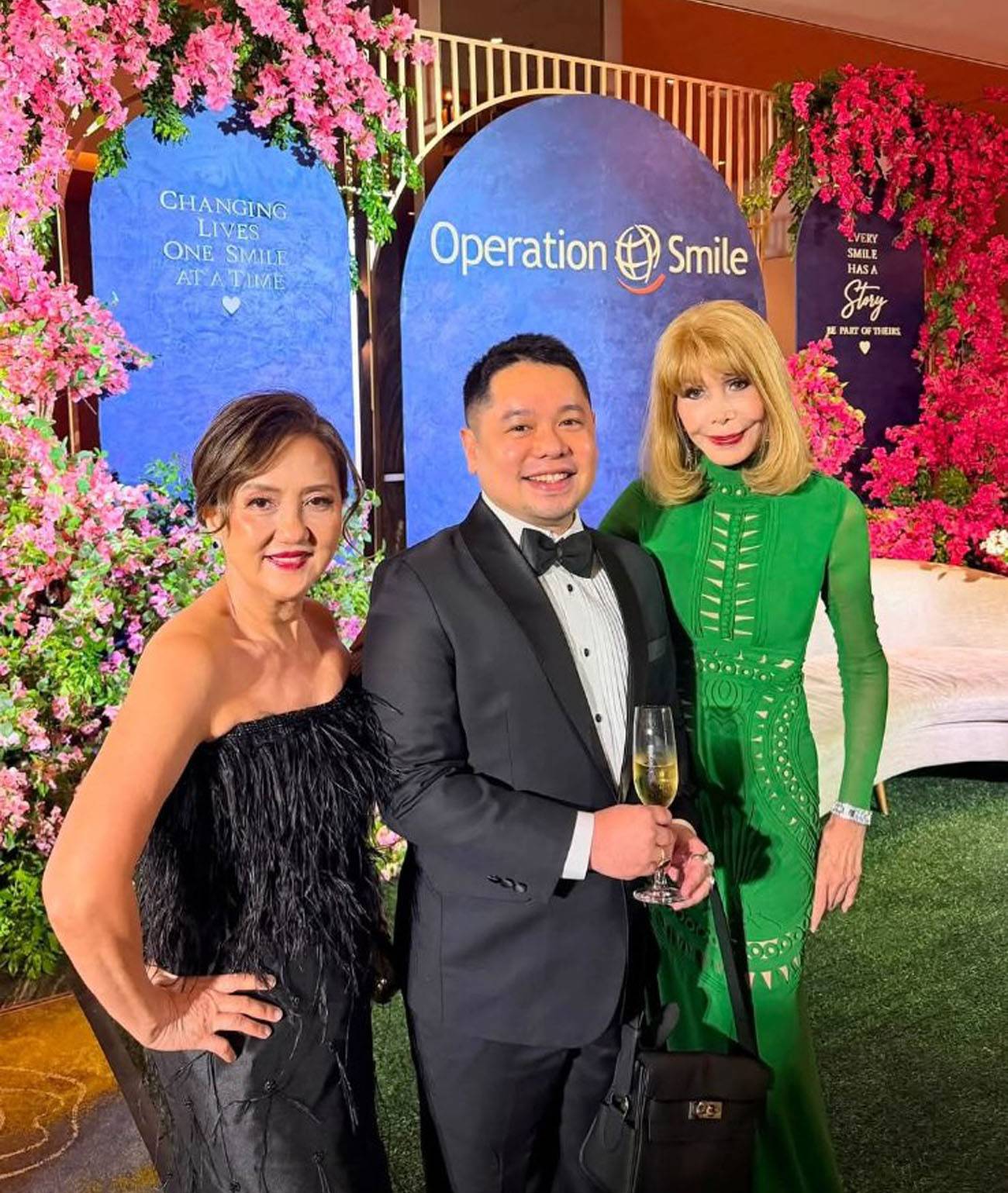 Michael Acebedo Lopez flanked by Marilou Ong and Marguerite Lhuillier.