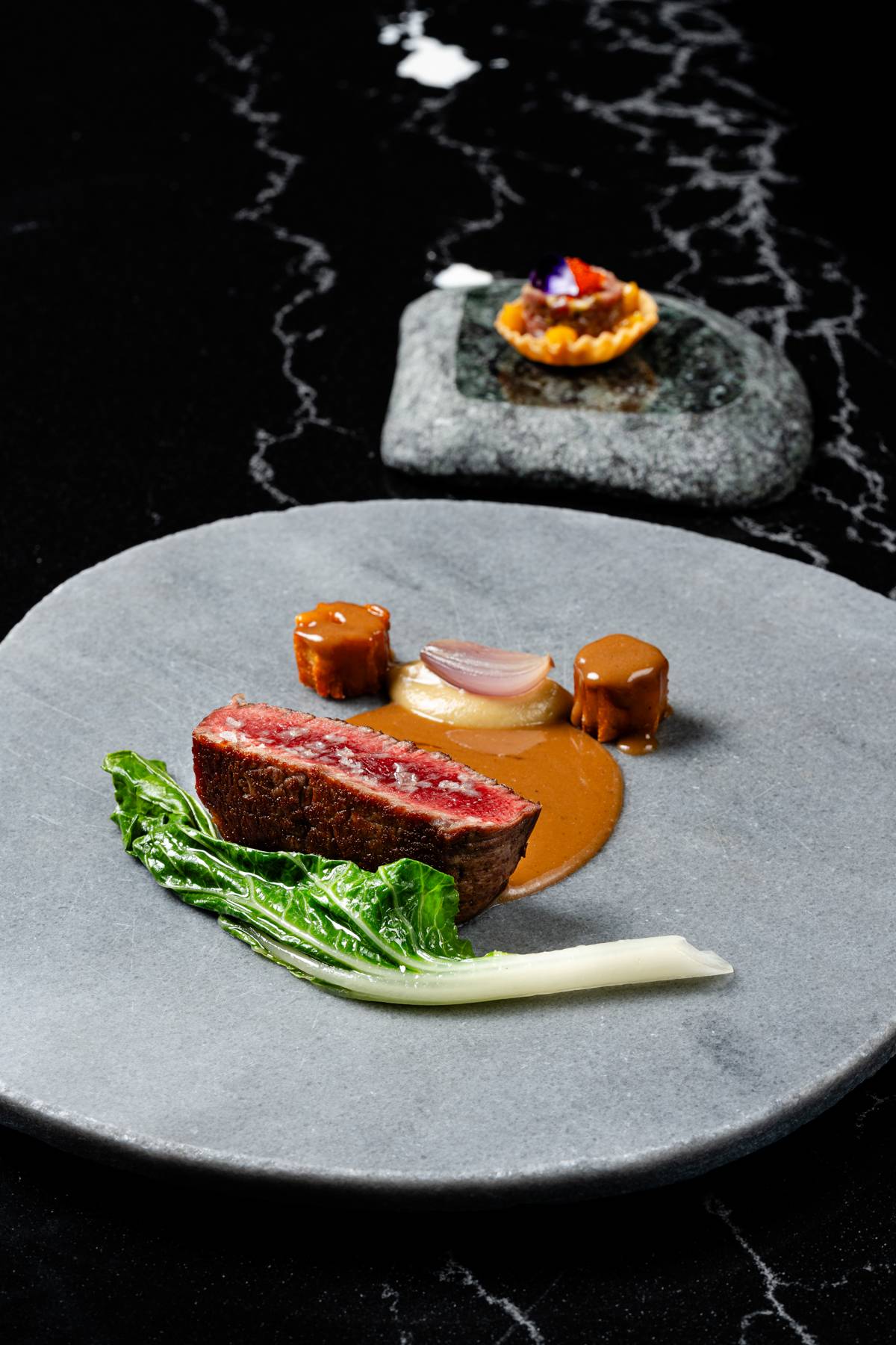 Fourth Course — Solomillo de Vaca, Salsa Cafeì de Paris, Paveì y Berenjana Asada.