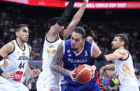 KAI Sotto battles through two Jordanian defenders as he drives to the basket, before his game-clinching block sent the Mall of Asia Arena into a frenzy.