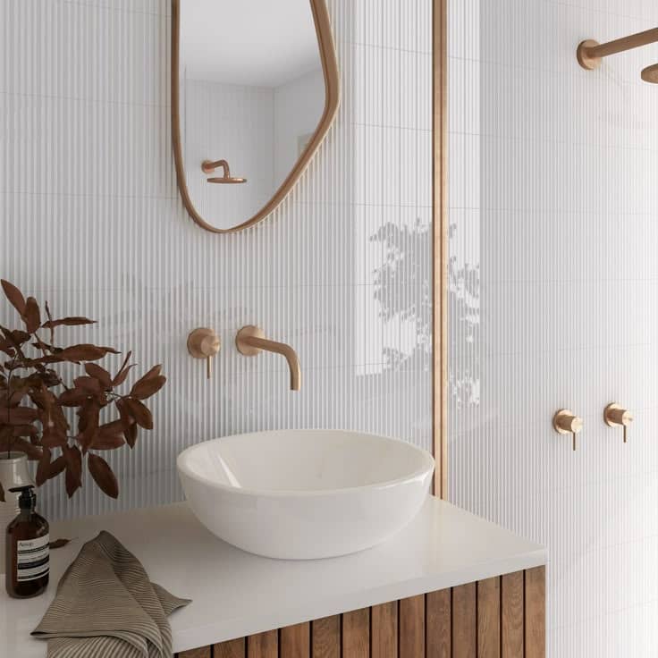 Pretty and practical can coexist. Ceramic wall tiles add character while offering an easy-to-clean finish for moisture-prone areas.