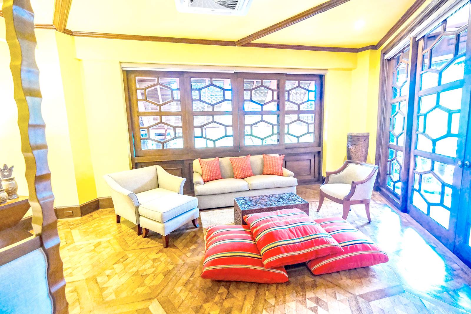 THE Marawi room celebrates Maranao and broader Mindanaoan heritage through traditional textiles, intricate woodcarvings and a distinctive carved bed board.