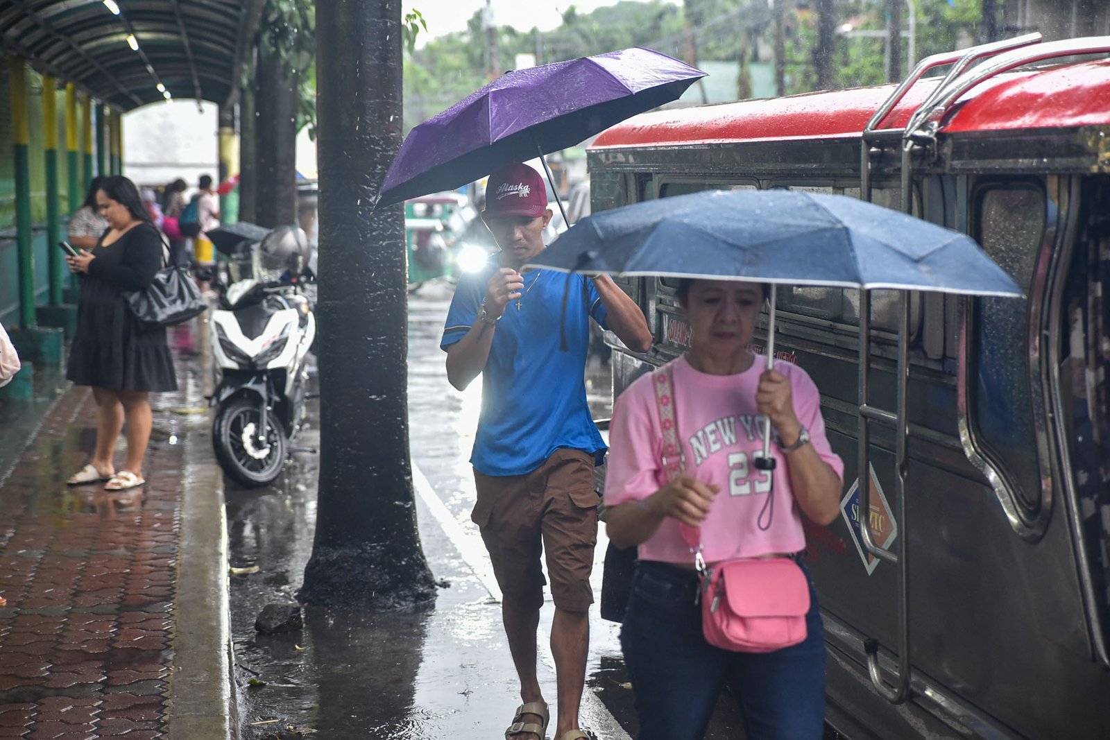Voters in Dasmariñas City cast their ballots despite a red rainfall warning brought by the southwest monsoon during the special election for Cavite’s 4th Legislative District on August 29.

COMELEC Chairman George Erwin Garcia said low voter turnout is expected due to the inclement weather.  l Zedrich Xylak Madrid