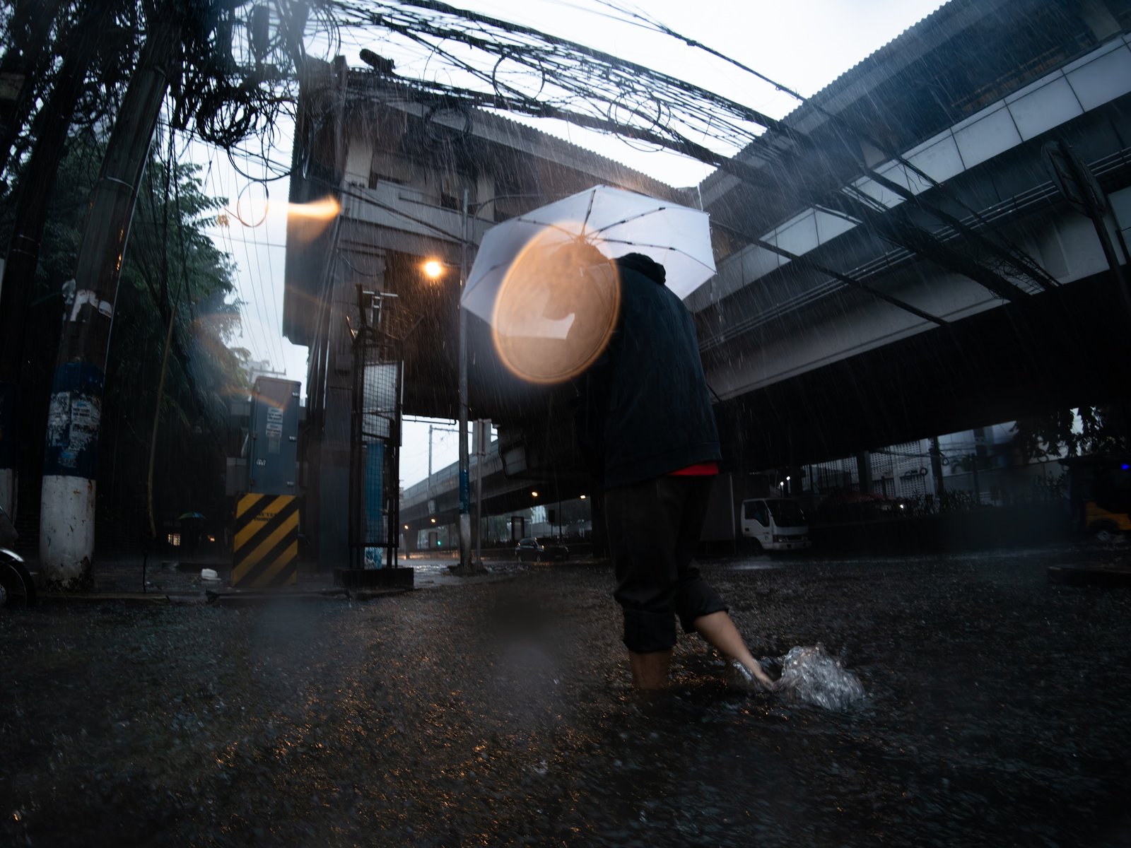 Floodwaters cover a road at the corner of Taft Avenue and UN Avenue in Manila on 29 August 2026, as heavy rains brought by the southwest monsoon, or habagat, inundated parts of the capital. PAGASA issued a Red Rainfall Warning for Metro Manila, warning of serious flooding in low-lying and flood-prone areas.