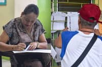 VOTERS in Dasmariñas City braved a red rainfall warning brought by the southwest monsoon as they cast their ballots during the special election for Cavite’s 4th Legislative District on Saturday.