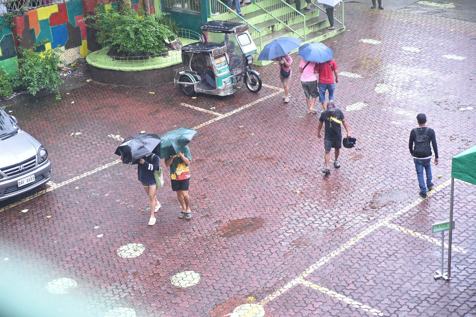 Voters in Dasmariñas City cast their ballots despite a red rainfall warning brought by the southwest monsoon during the special election for Cavite’s 4th Legislative District on August 29.

COMELEC Chairman George Erwin Garcia said low voter turnout is expected due to the inclement weather.  l Zedrich Xylak Madrid