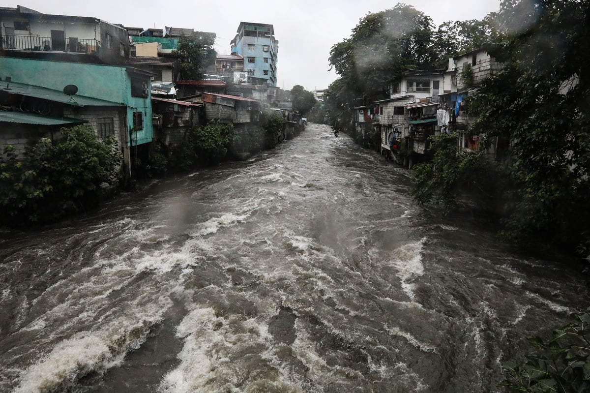 RISING distress A strong current was seen at Lagarian Creek in Quezon City, with water overflowing amid continued heavy rains on Saturday, 29 August.