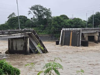 Bridge collapse leaves 4 missing