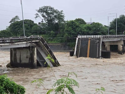 Bridge collapse leaves 4 missing