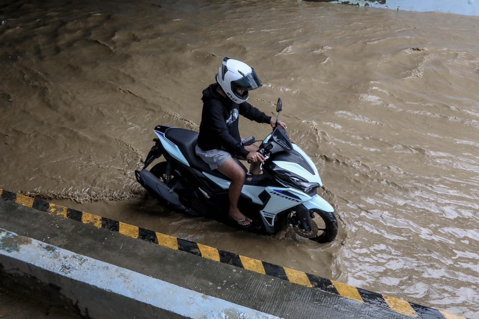 Scenes in Marikina City as Tullahan River overflows, reaching up to 18.5 meters at 1AM on Sunday, 30 August, 2026.| Aram Lascano