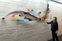 ARTIST Impy Pilapil with ‘Flight,’ an original sculpture she created for Singapore Airlines in 2015. After a decade at SIA’s SilverKris Lounge in Ninoy Aquino International Airport Terminal 3, the artwork now joins three of Pilapil’s existing works at the Singapore Embassy in Manila, bringing four of her sculptures together in one home.