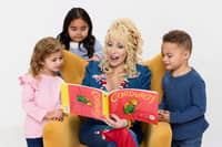 ‘I’m the Book Lady to lots of kids, and I take great pride in that,’ Dolly Parton (2nd from right) once said in an interview with NBC’s Boston affiliate.