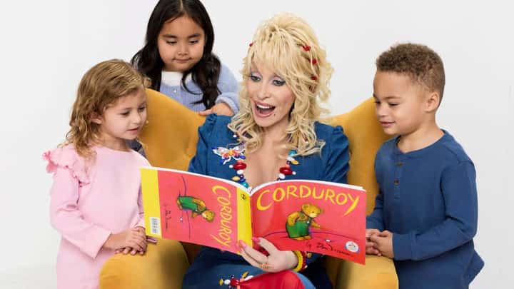 ‘I’m the Book Lady to lots of kids, and I take great pride in that,’ Dolly Parton (2nd from right) once said in an interview with NBC’s Boston affiliate.