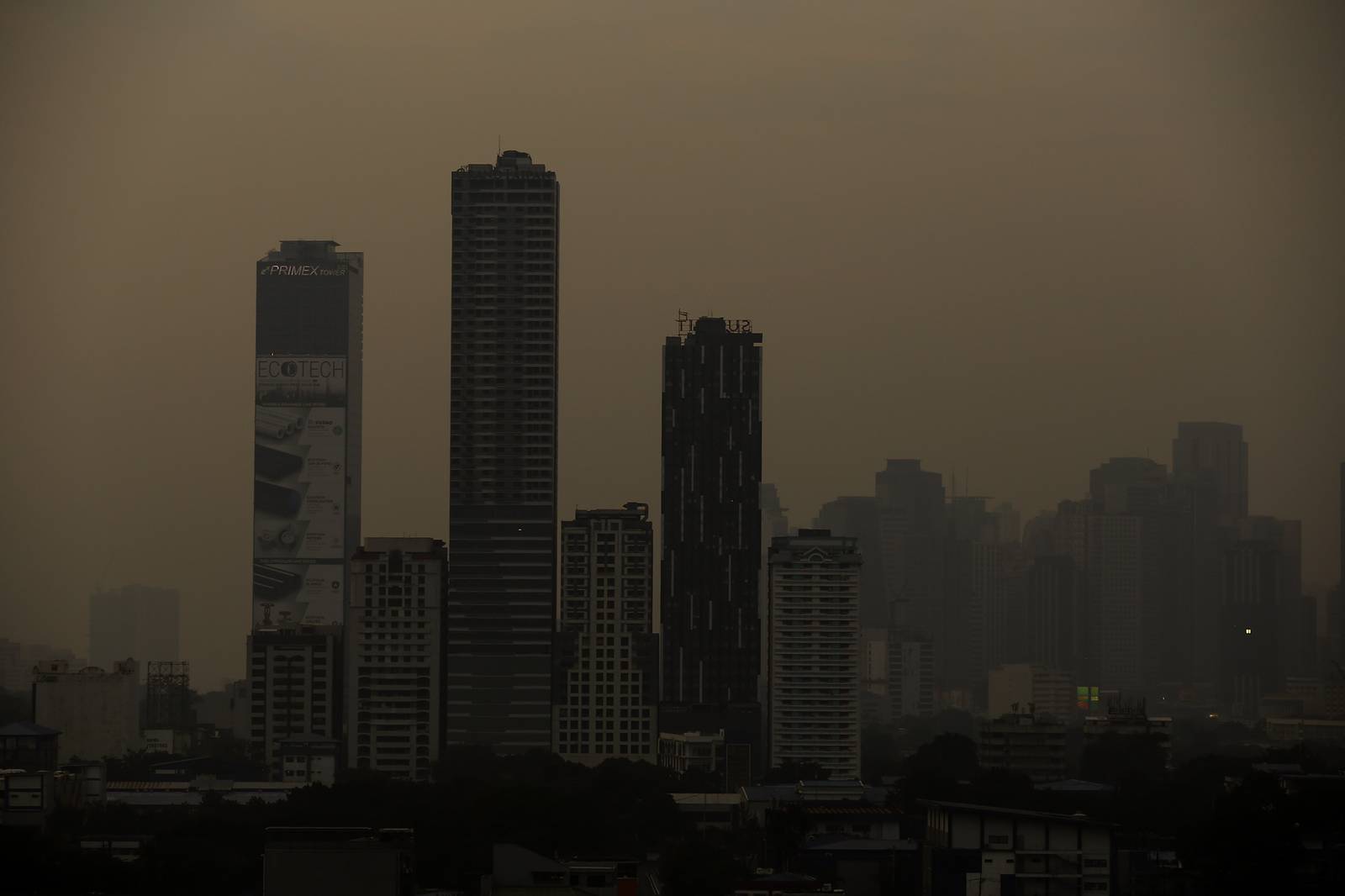 A thick haze blankets the Metro Manila skyline at 6:01am on 01 September 2026 as smoke from wildfires in Kalimantan is carried toward the Philippines by cross-equatorial winds. Air quality monitoring sensors across Metro Manila recorded AQI levels ranging from Unhealthy for Sensitive Groups to Very Unhealthy. Local government units, including Quezon City, have suspended face-to-face classes at all levels in public schools amid the poor air quality.