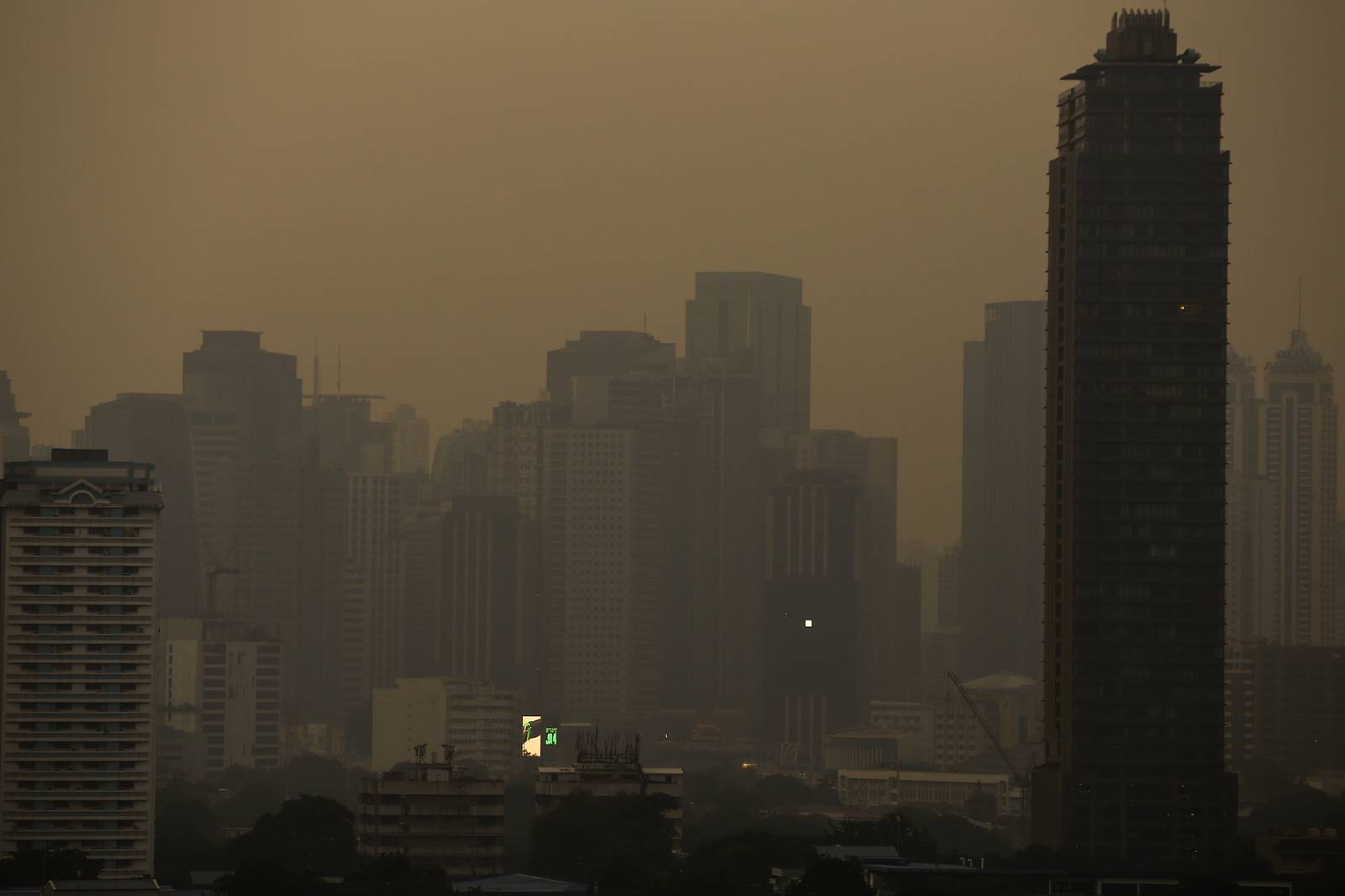 A thick haze blankets the Metro Manila skyline at 6:01am on 01 September 2026 as smoke from wildfires in Kalimantan is carried toward the Philippines by cross-equatorial winds. Air quality monitoring sensors across Metro Manila recorded AQI levels ranging from Unhealthy for Sensitive Groups to Very Unhealthy. Local government units, including Quezon City, have suspended face-to-face classes at all levels in public schools amid the poor air quality.