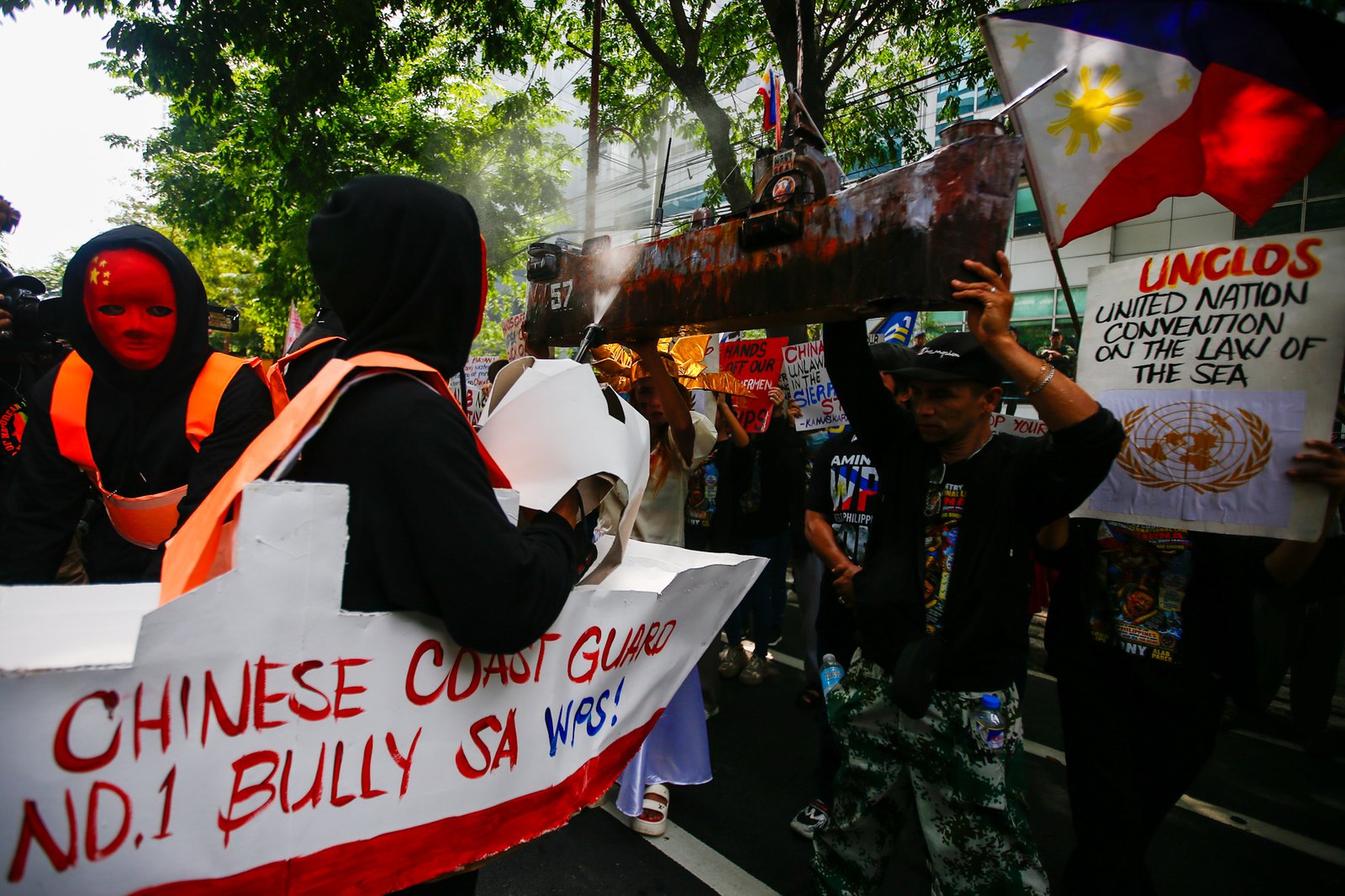 Activists gather outside the Chinese Embassy in Makati City on Monday, 31 August 2026, to protest China’s call for the Philippines to remove the BRP Sierra Madre from Ayungin Shoal. They also urged the Chinese Coast Guard to stop harassing Filipino fishermen and respect the 2016 arbitral ruling.