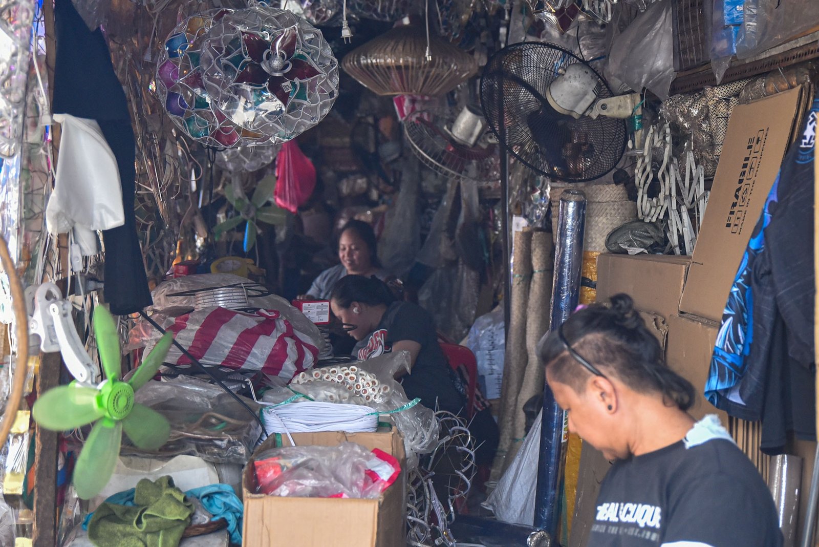 Christmas lanterns and other handicrafts are displayed in stalls under Quezon Bridge in Manila on August 31, ahead of the start of 'Ber' months. | Zedrich Xylak Madrid