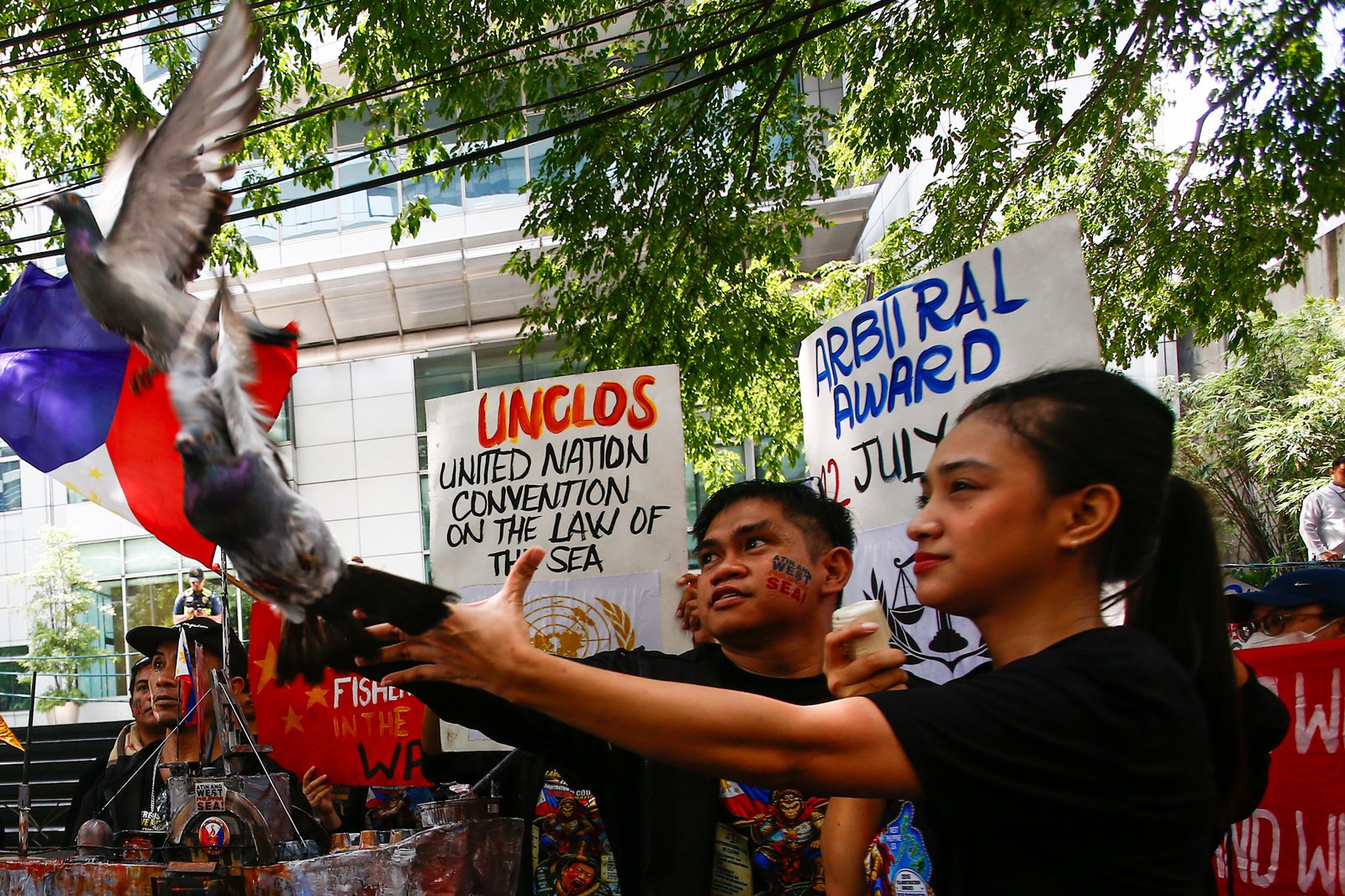 Activists gather outside the Chinese Embassy in Makati City on Monday, 31 August 2026, to protest China’s call for the Philippines to remove the BRP Sierra Madre from Ayungin Shoal. They also urged the Chinese Coast Guard to stop harassing Filipino fishermen and respect the 2016 arbitral ruling.