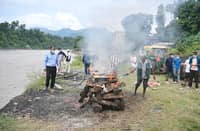 MOURNERS cremate the body of deceased victim Ayush Khadka, after flash floods in Nepal's Chitwan district on 31 August 2026.