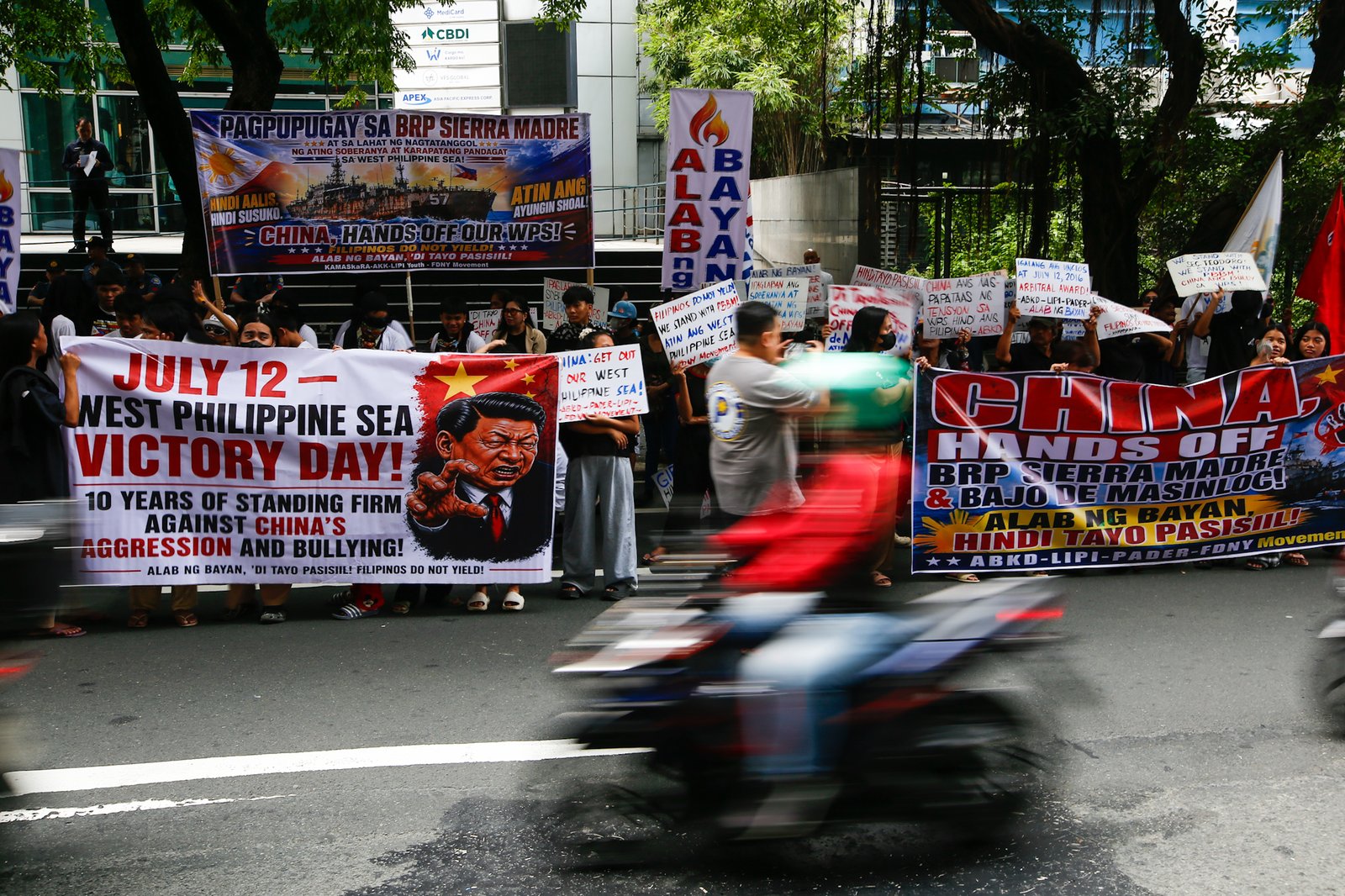 Activists gather outside the Chinese Embassy in Makati City on Monday, 31 August 2026, to protest China’s call for the Philippines to remove the BRP Sierra Madre from Ayungin Shoal. They also urged the Chinese Coast Guard to stop harassing Filipino fishermen and respect the 2016 arbitral ruling.